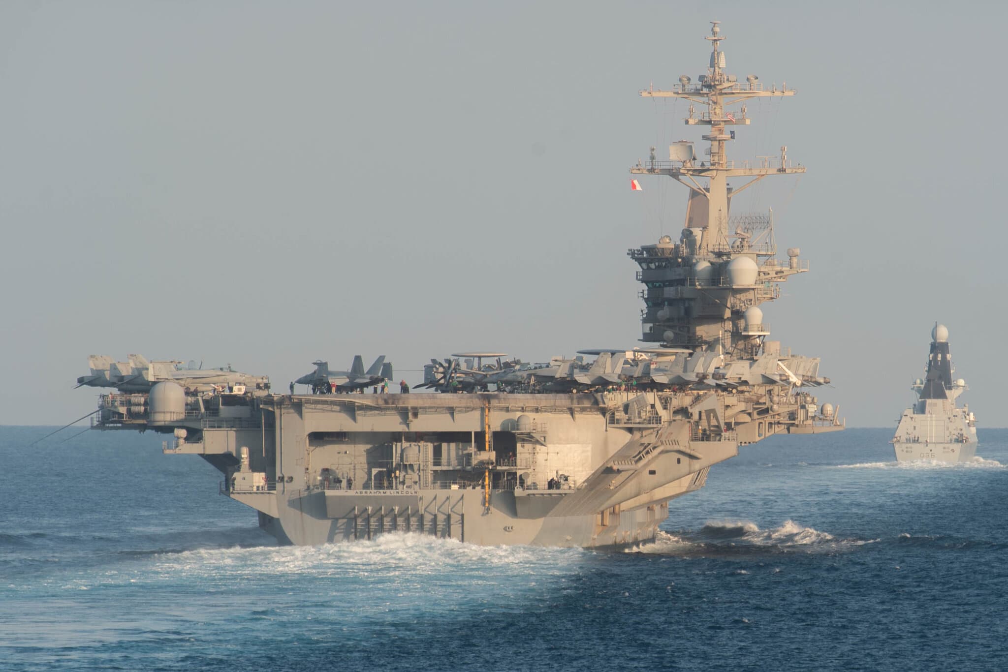 Top Admiral Praises Sailors but Concedes Hardships After Visit to U.S.S. Lincoln