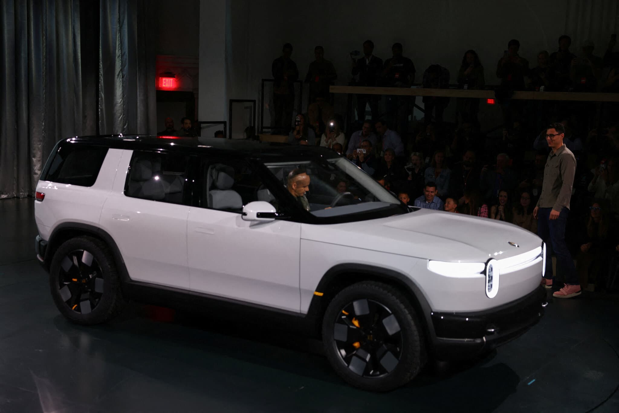 Uber to Buy Rivian Vehicles for Use as Driverless Taxis