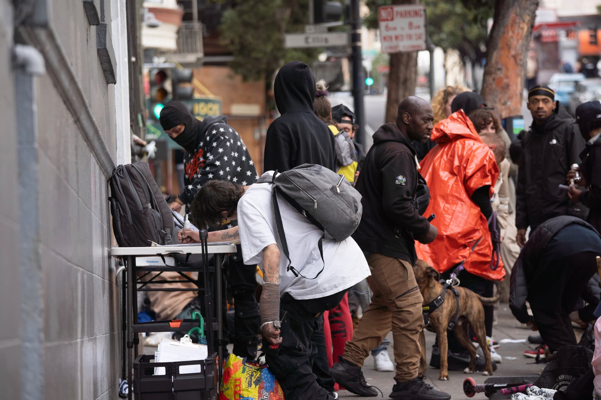 These Masked Men in San Francisco Want One Thing: Your Signature