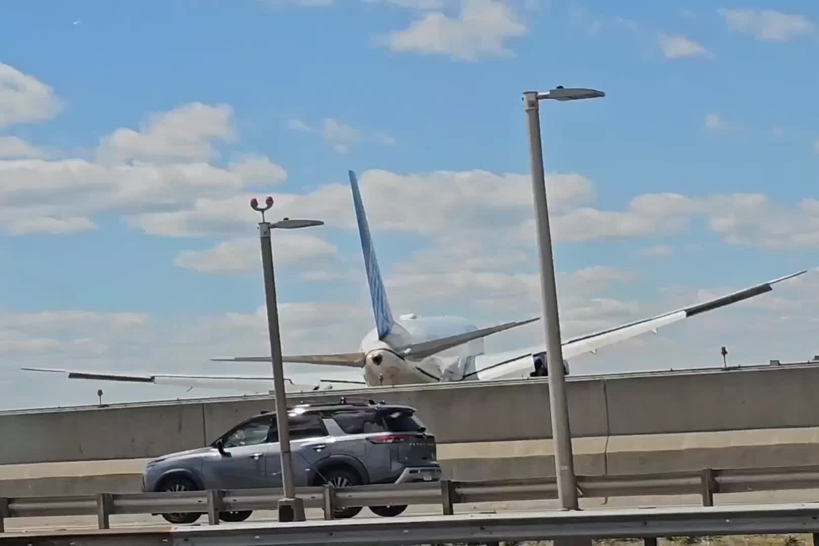 Tractor-Trailer and Light Post Damaged as Plane Lands at Newark Airport