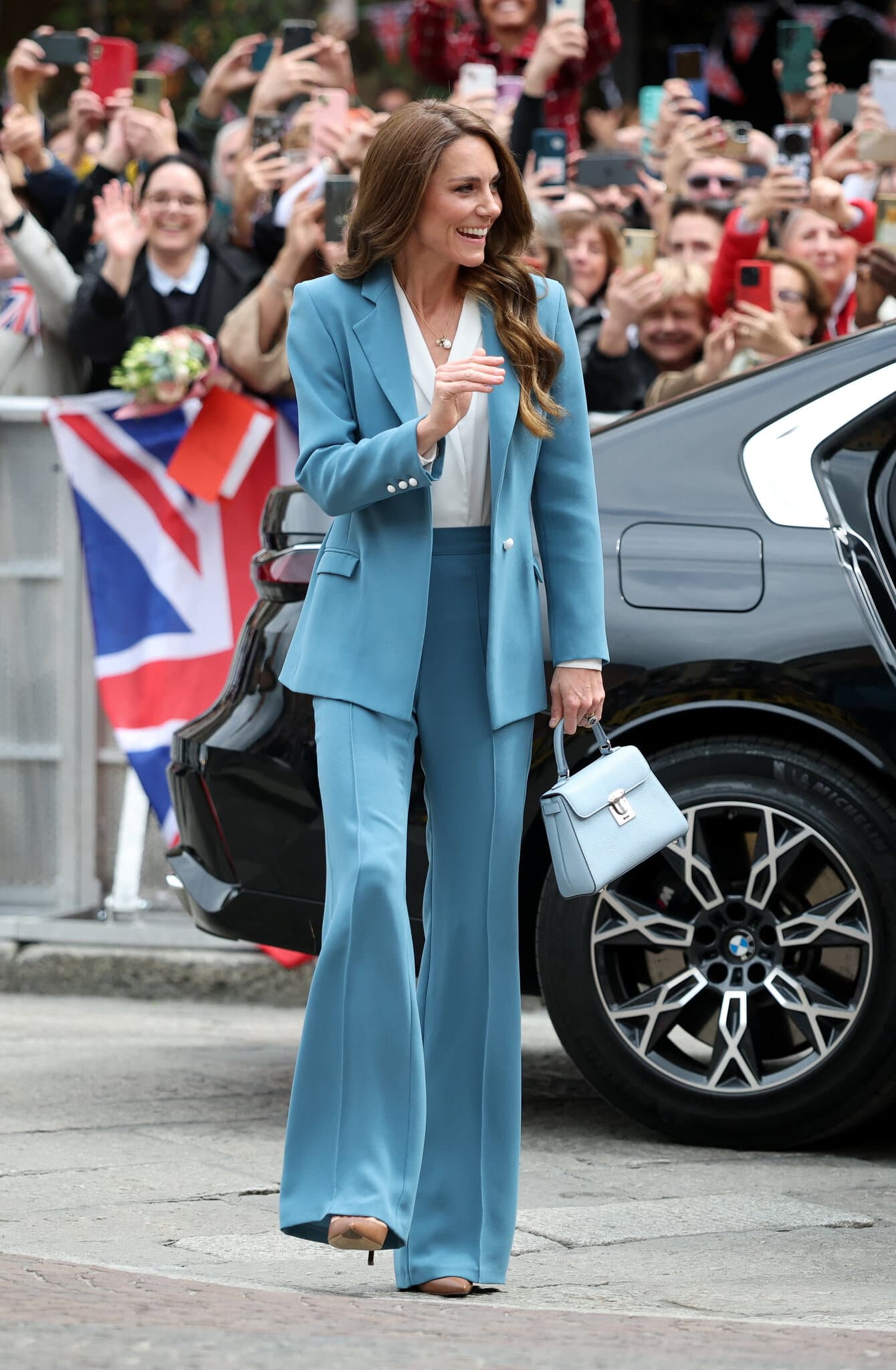 In Italy, Princess Catherine Puts Her Wardrobe to Work