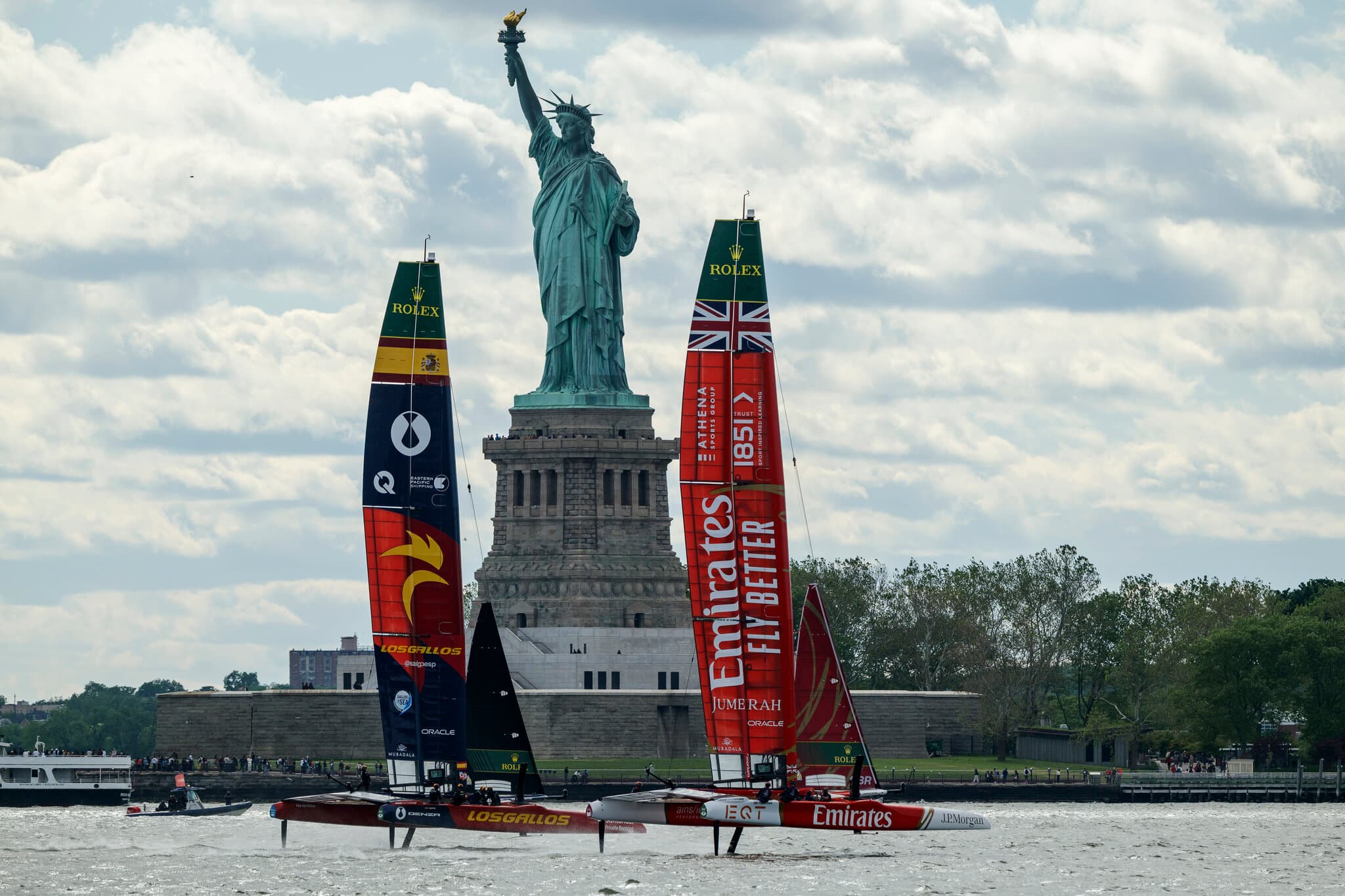 High-Speed Sailboats Race Past the New York Skyline