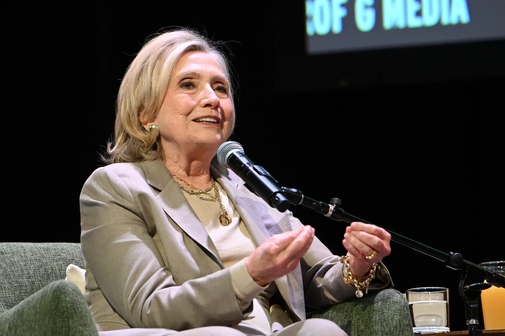 Hillary Clinton Steps to the Podcast Mic as Midterms Approach